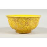 A CHINESE PORCELAIN YELLOW CIRCULAR BOWL.