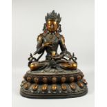 A LARGE CHINESE BRONZE SEATED GOD set with stones 24ins high.