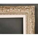 An early 20th century carved wood frame, rebate size 14" x 25.5", 35 x 65 cm, without slip 15.5" x