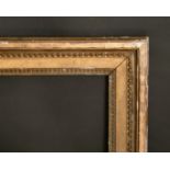 An 18th century moulded and composition frame, rebate size 29.5" x 24", 75 x 61 cm.