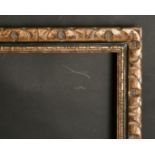 A 20th century carved wood frame, wide rebate 36" x 52", 92 x 132 cm.