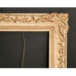 An early 20th century gilt composition frame, rebate size 20" x 30", 51 x 76 cm.