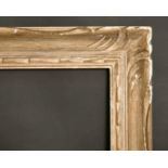 A 20th century carved wood frame, 19.75" x 28.75", 50 x 72 cm.