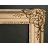 An early 20th century composition frame, rebate size 29" x 36", 73.5 x 92 cm.