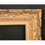 An early 20th century carved wood frame, rebate size 10.5" x 14", 17 x 35 cm, (slip slightly