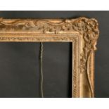 A 20th century gilt composition frame, 22" x 40", 56 x 101.5 cm.