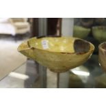 An Iran style pottery pouring bowl.