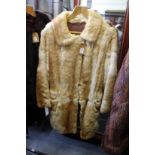 A ladies' fur coat.