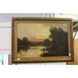 R L Snelling "Rural River Landscape at Sunset with a Church Beyond" oil on canvas, signed.