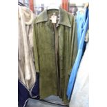 A ladies' green leather full length coat.