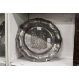 An armorial pewter dish.