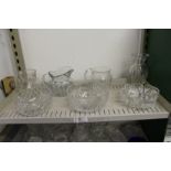 Cut glass items to include jugs, bowls and a vase.