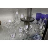 A small group group of Orrefors glassware to include small vases with engraved decoration.