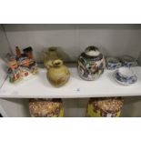 A Staffordshire house, two unusual stoneware pots, a ginger jar and cover and Meissen cups and a