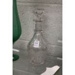 A good cut glass decanter engraved with grapes and vines.