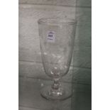 An engraved and cut glass pedestal celery vase.