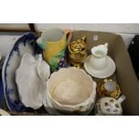 A collection of decorative china to include a large pottery jug, floral teapot, a bunny rabbit