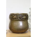 An Art Nouveau style copper jardiniere.