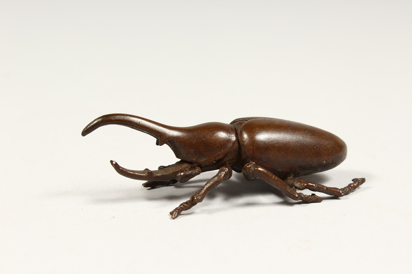 A JAPANESE BRONZE RHINOCEROS BEETLE 3ins long - Image 2 of 3