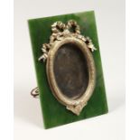 A GOOD RUSSIAN GREEN JADE UPRIGHT PHOTOGRAPH FRAME with silver mounts. 5.75ins high, 3.75ins wide