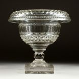 A HOBNAIL CUT CIRCULAR PEDESTAL FRUIT BOWL on a square base. 9ins high.