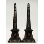 A VERY GOOD PAIR OF EGYPTIAN MARBLE OBELISK with Egyptian figures and hieroglyphs. 20ins high.