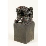 A CHINESE BRONZE DOG OF FO SQUARE SEAL 7.5ins high.