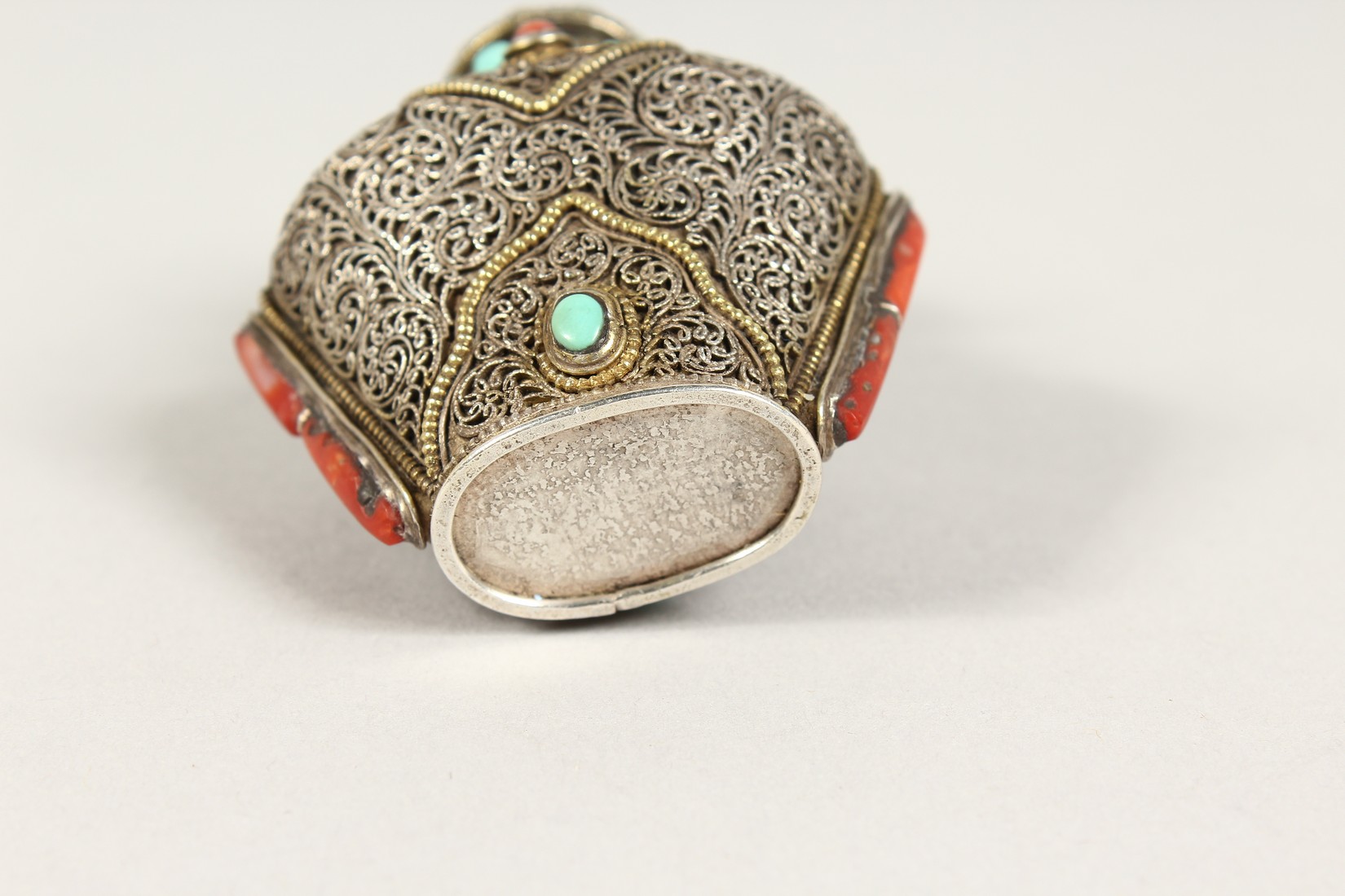 AN ISLAMIC FILIGREE SILVER SCENT BOTTLE with coral and turquoise stones. 2.5ins - Image 5 of 6