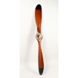 A LARGE WOODEN PROPELLER 4ft 10ins long