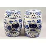 A PAIR OF CHINESE BLUE AND WHITE BARRELL SEATS 18ins high
