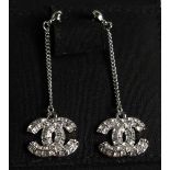 A PAIR OF CHANEL STYLE ENTWINED C DROP EARRINGS in a Chanel box.