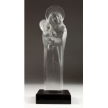 A LARGE LALIQUE CRYSTAL MADONNA AND CHILD, CIRCA 1950 on a black base. Signed, 13.5 ins high.