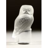 A SMALL FROSTED GLASS LALIQUE OWL. 3.5ins high signed