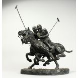 H. HAND A SUPERB BRONZE POLO GROUP, TWO POLO PLAYERS ON HORSEBACK. Signed H. Hand, No. A 40. 18ins