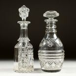 TWO CUT GLASS DECANTERS AND STOPPERS