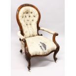 A GOOD VICTORIAN MAHOGANY SPOON BACK ARMCHAIR, open arms, sepentine fronted seat on cabriole legs,