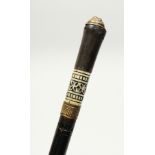 AN INDIAN BONE INLAID SWORD STICK. 23ins long.