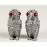 A PAIR OF SILVER PLATE OWL SALT AND PEPPERS