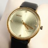 A SEIKO GOLD WRISTWATCH with leather strap, in a white bag,