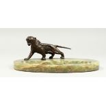 AN ART DECO ONYX DESK STAND with a chrome tiger. 9.5ins long.