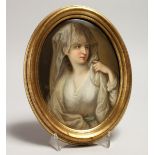 A CONTINENTAL PORCELAIN OVAL PLAQUE of a young lady in a lace dress, in a gilt wood oval frame. 7.