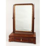 A GEORGIAN MAHOGANY TOILET MIRROR, gilded glass mirror, the base with three drawers on bracket