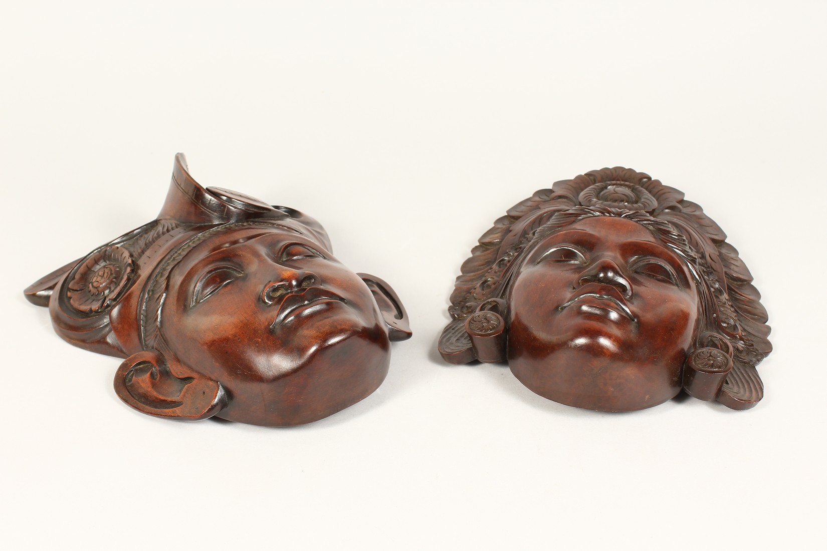 A PAIR OF EARLY CARVED HARDWOOD MASKS - Image 2 of 4