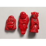 THREE CARVED CORAL FIGURES OF MEN