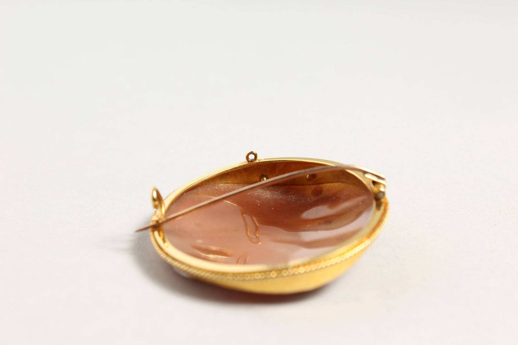 A LARGE 18CT GOLD OVAL CAMEO BROOCH, landscape, horse drawn cart. - Image 3 of 4