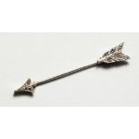 AN ARROW BROOCH PIN.