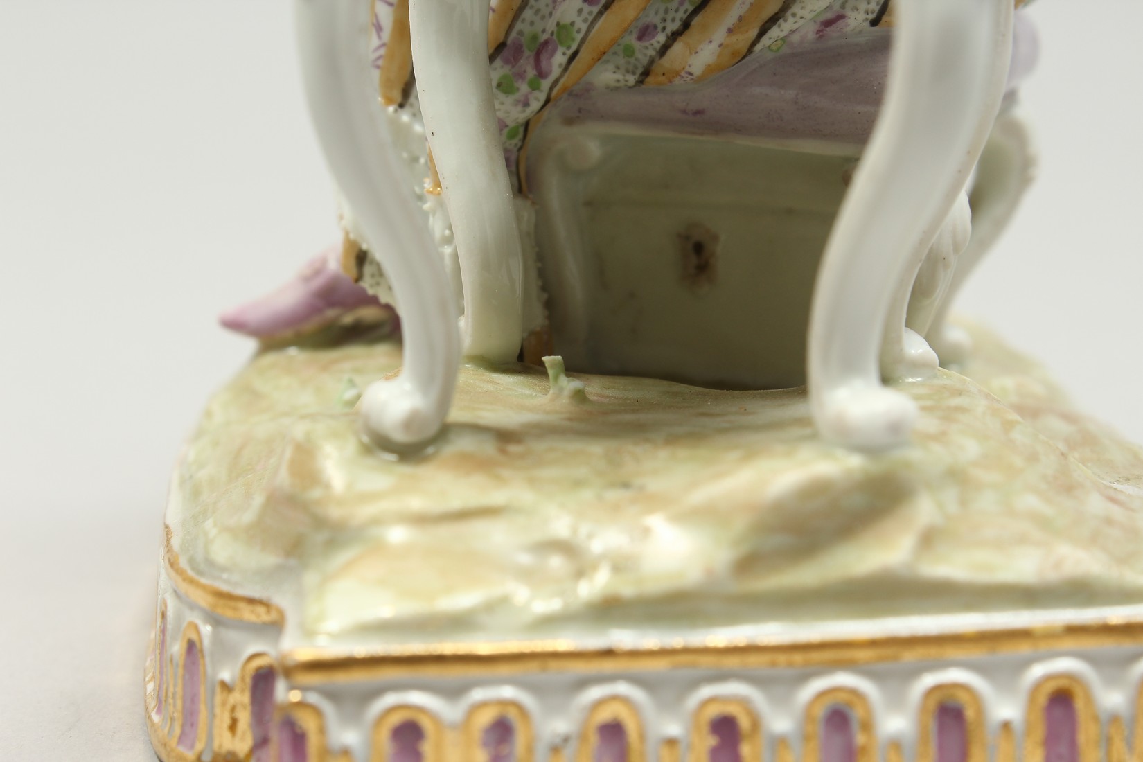 A GOOD MEISSEN PORCELAIN GROUP 'SENSE AND SMELL', a young lady sitting beside a table smelling - Image 9 of 13