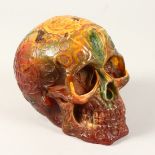 AN AMBER SKULL 6ins long