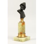 AFTER THE ANTIQUE A bronze bust of a Roman, on an onyx base 6.5ins high.