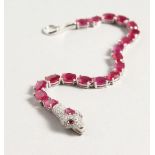 A SILVER RUBY SET SNAKE BRACELET.